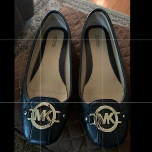 MK black leather flats